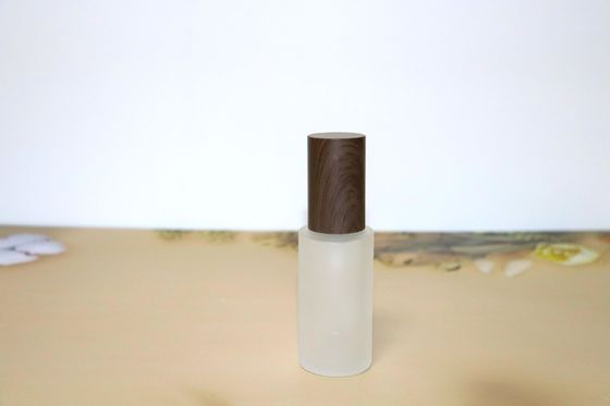 Botol kaca beku dengan dispenser pompa lotion Emulsi yang dapat diisi ulang Botol krim kosmetik